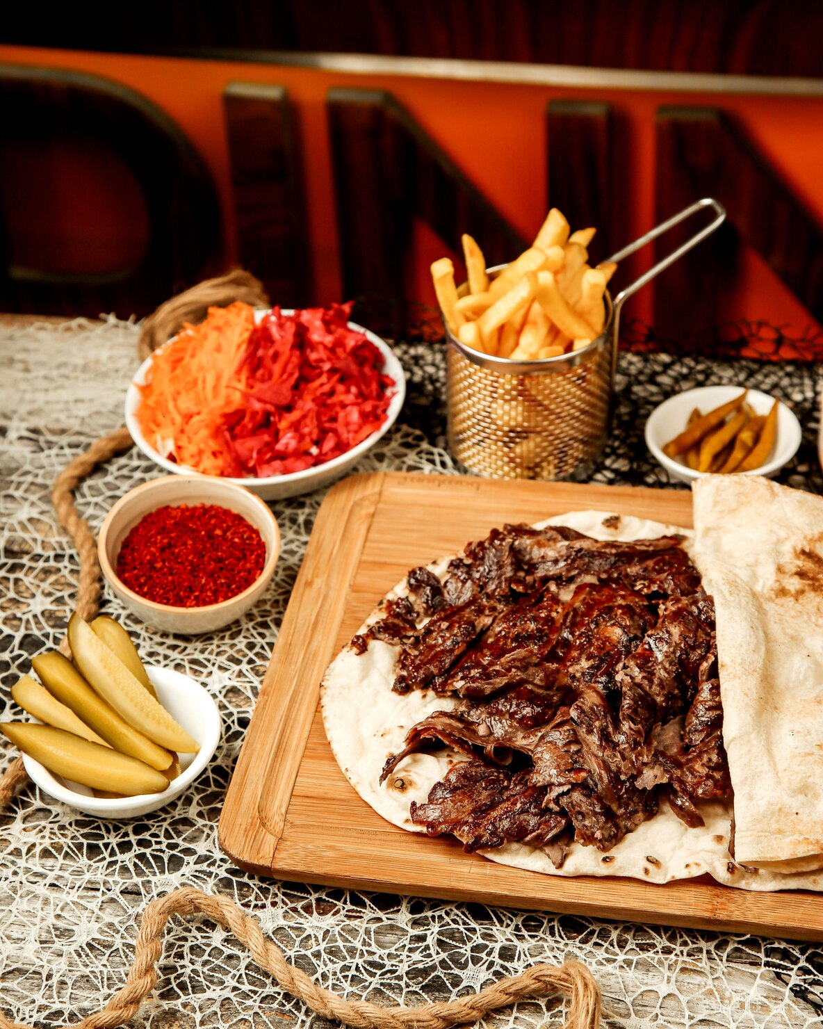 lamb kebab doner placed flatbread served with fried pickled cucumber cabbage 140725 8323
